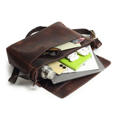 Everyday carry bags showcasing a leather messenger bag filled with a laptop, phone, and essentials.